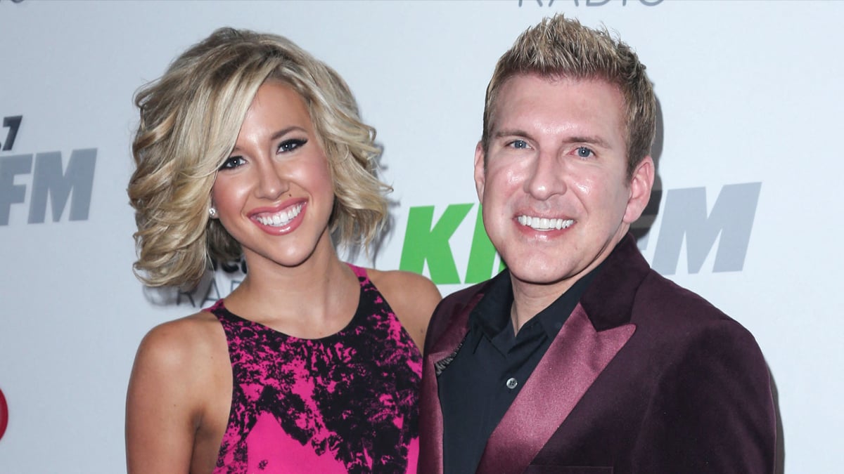 Savannah Chrisley poses with her dad Todd Chrisley