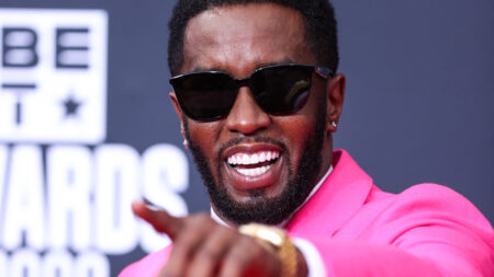 Sean "Diddy" Combs in a pink outfit.