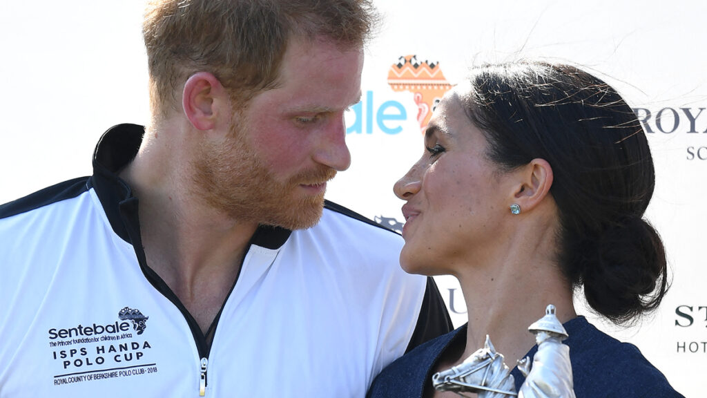 Prince Harry and Meghan Markle pack on the PDA at a Sentebale Polo event.