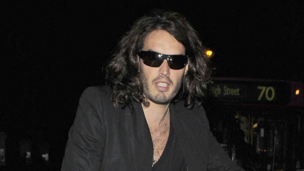 Russell Brand arriving at Boujis nightclub in South Kensington with Adam Sandler. They arrived at the same time but Adam showed his admiration for the fellow comedian / actor by waiting in his car and watching as photographers took Russell's picture