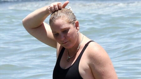 Prince Andrew accuser and Epstein victim Virginia Giuffre better known as Virgina Roberts enjoys a day at the beach