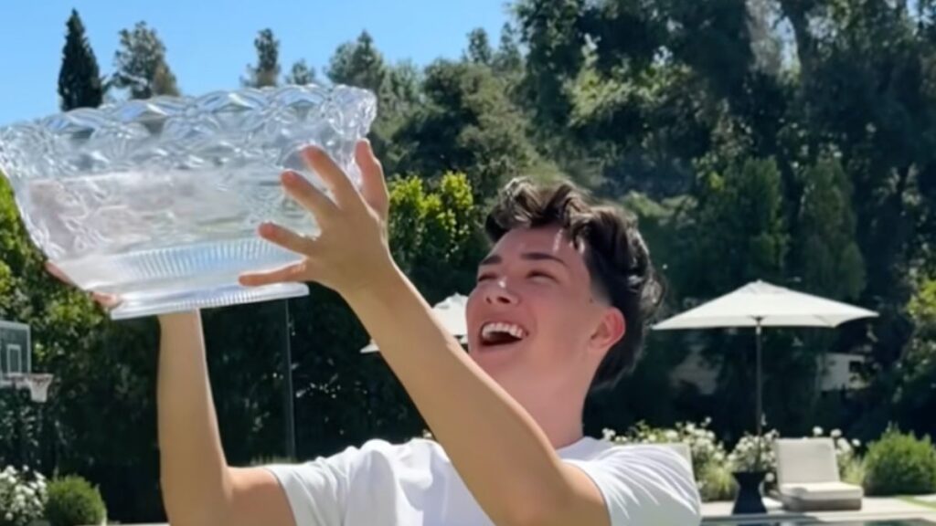 james charles holding up a bowl of water for ice bucket challenge