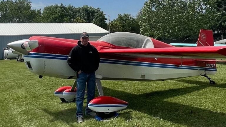 pilot terry williamson, by his plane