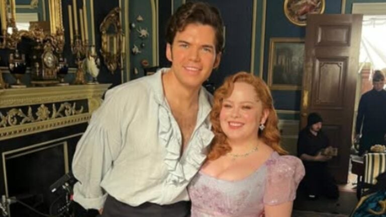 Nicola Coughlan and Luke Newton smiling