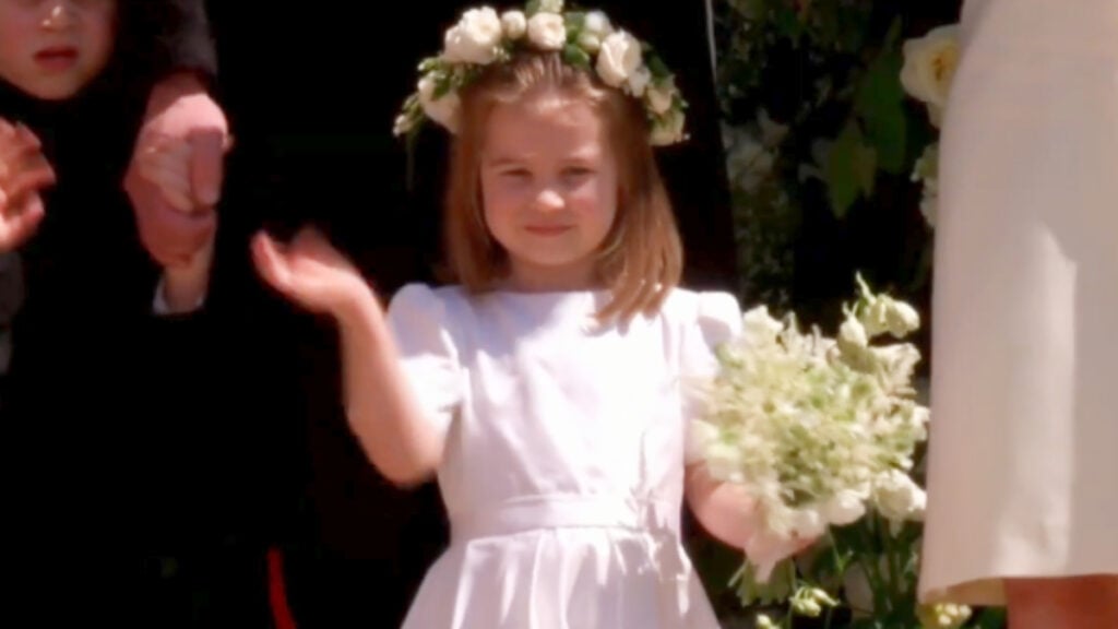 Princess Charlotte in her Bridesmaids dress at Meghan Markle's 2018 royal wedding.