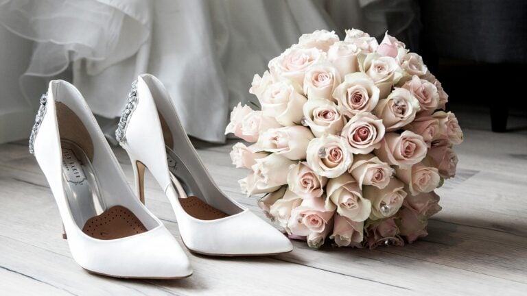 California Bride Considers Skipping Thank-Yous After Wedding Almost Ruined, ‘Everything Was Perfect—Almost’ wedding shoes and bouquet of flowers on ground