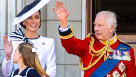 Kate Middleton and King Charles on the Palace Balcony.