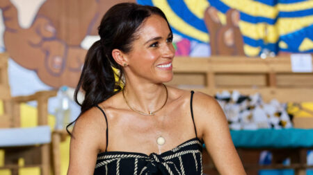 Meghan Markle in a striped dress during her tour of Colombia.