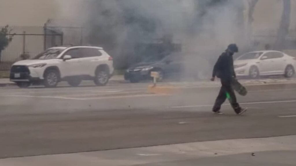 Unfazed California Skateboarder Shrugs Off Police Munitions at ICE Protest Before Flipping the Bird: ‘Legend’ A picture of the California skateboarder.