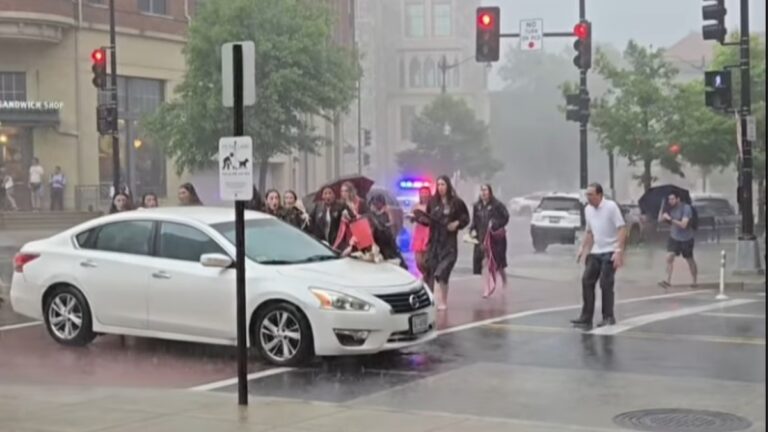 Car runs into crosswalk full of students