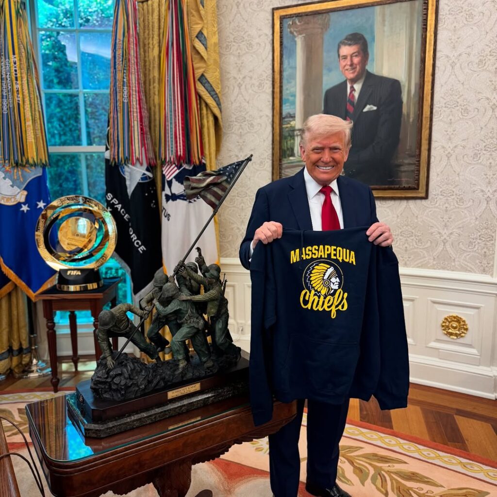 Donald Trump in Oval Office with sweatshirt