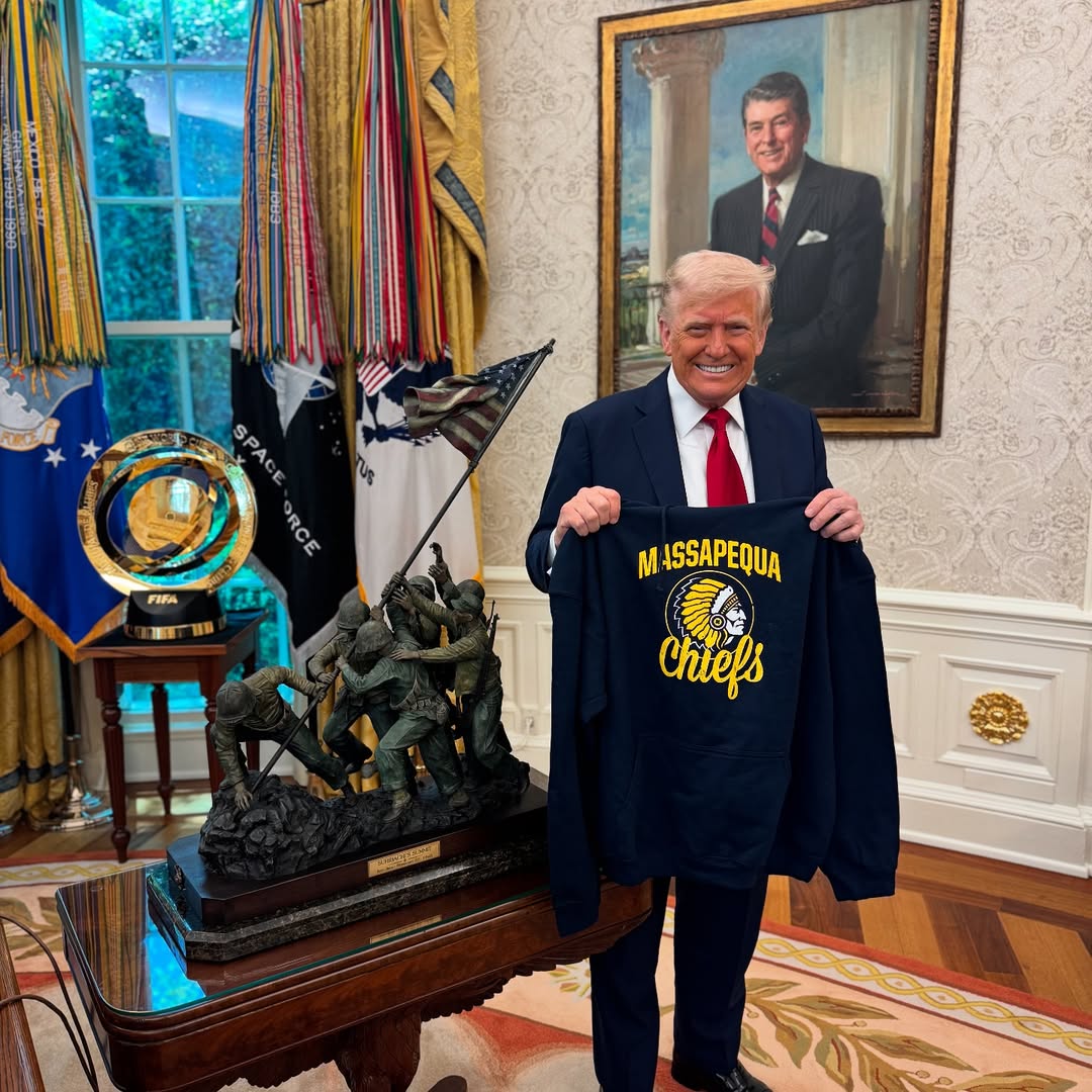 Donald Trump in Oval Office with sweatshirt