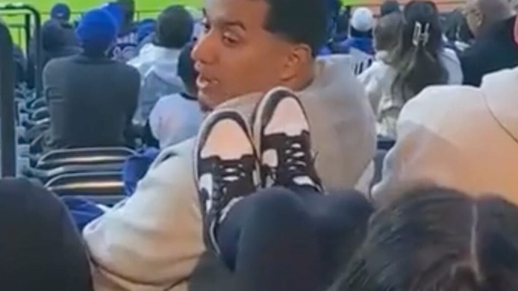 Woman kicking man at Mets game