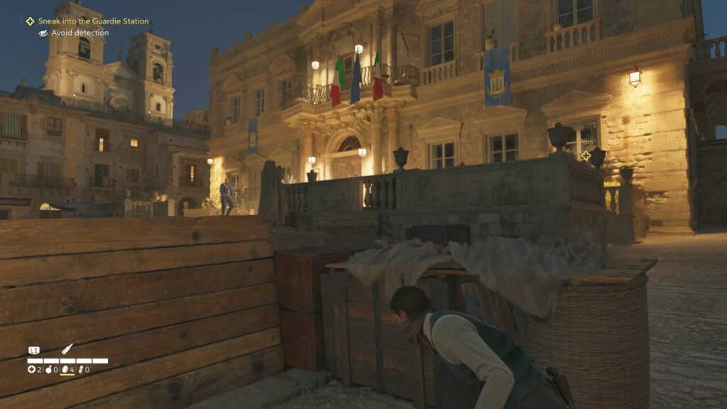 Enzo sneaking into a building