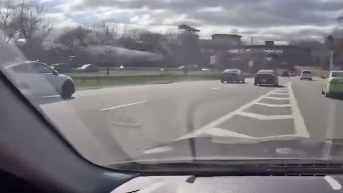 New york driver almost hits cop