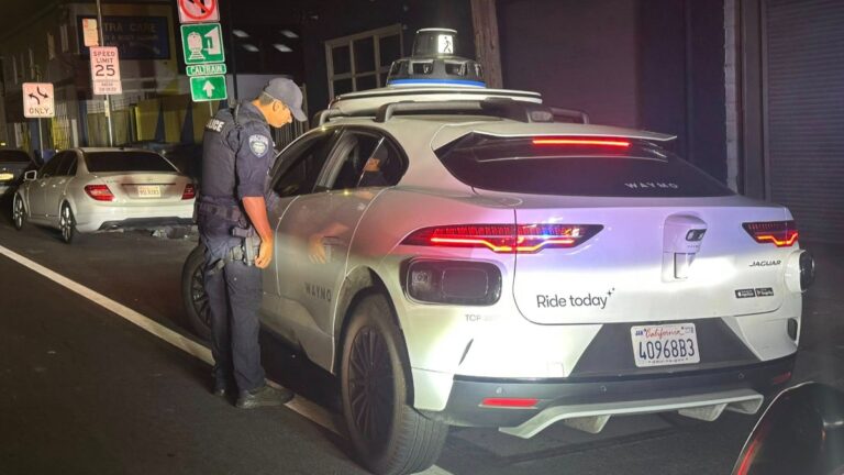 cop pulls over waymo