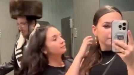 Women catch man in women's bathroom