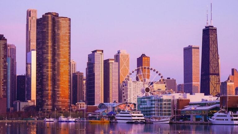 Angry and Supportive Illinois Crowd Tries to Fend Off ICE as They Surround Neighbor on His Balcony