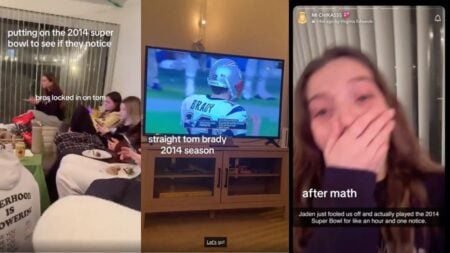 Guests at a Super Bowl party in Connecticut looking at their phones while a football game plays on TV.