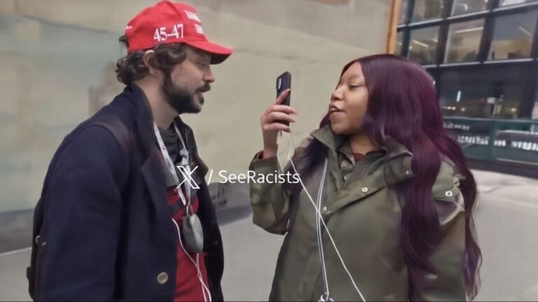 Man in red MAGA hat seen harassing woman on a New York street during reported hate crime incident.