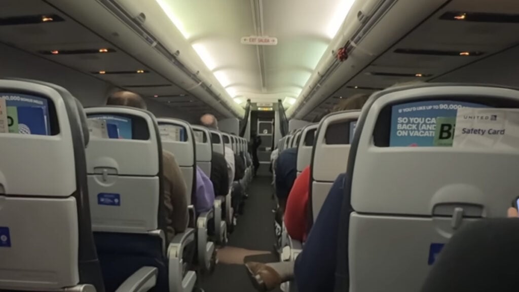 United Airlines Flight Attendant Shoves Passenger