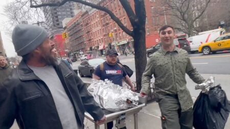 Trump-pardoned January 6 rioter Jake Lang carrying a roasted pig and a live goat outside New York City Mayor Zohran Mamdani's Gracie Mansion residence during an anti-Islam rally in Ramadan.