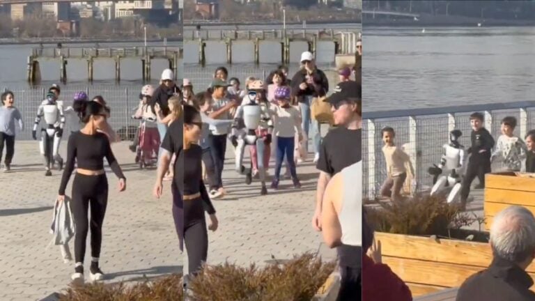 Unitree G1 humanoid robot running and interacting with children at Brooklyn Bridge Park in New York City on March 27 2026 as bystanders film the encounter