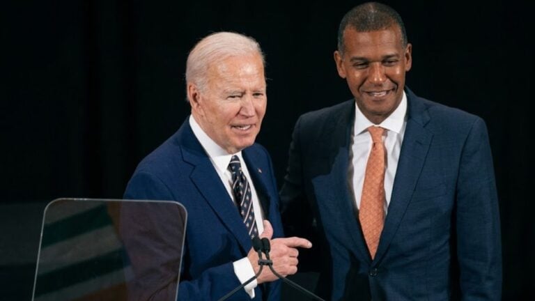 ‘Doesn’t He Look Like Barack?’: Reactions Pour In as Joe Biden Compares Black New York Trustee to Obama Former President Joe Biden and Jeffrey Scruggs at a podium during a portrait unveiling ceremony at Syracuse University in New York.