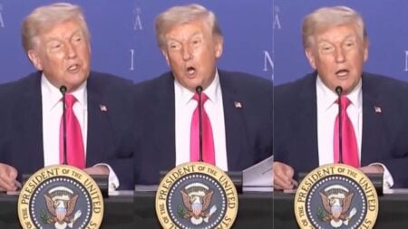 President Donald Trump speaking at a podium during a Tax Day roundtable event in Las Vegas, Nevada.