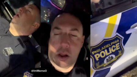 A Philadelphia Pennsylvania police patrol car parked on a residential street at night representing the viral video of a sleeping officer.