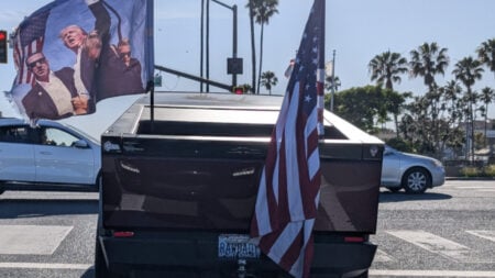 Tesla Cybertruck with flags