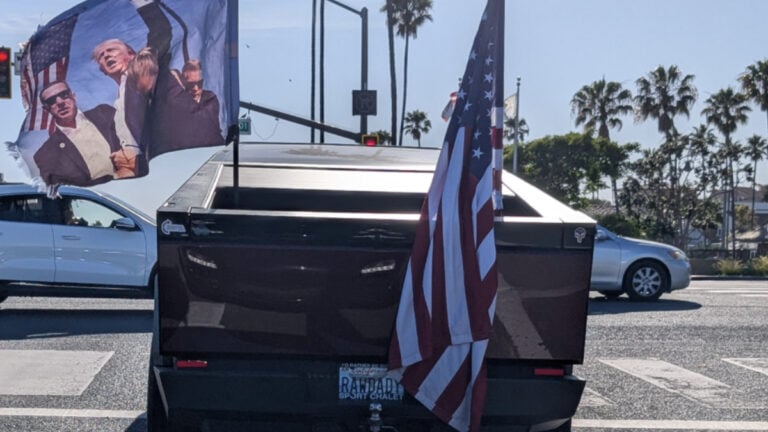 Tesla Cybertruck with flags
