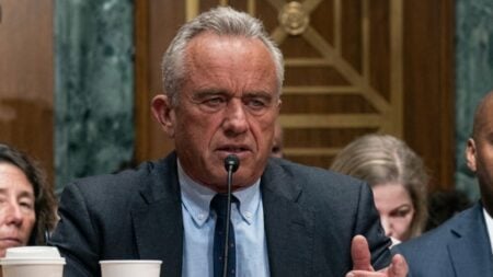 HHS Secretary RFK Jr. testifying before the Senate Finance Committee in Washington D.C. on April 22 2026 during questioning from Senator Elizabeth Warren about TrumpRx drug pricing claims.