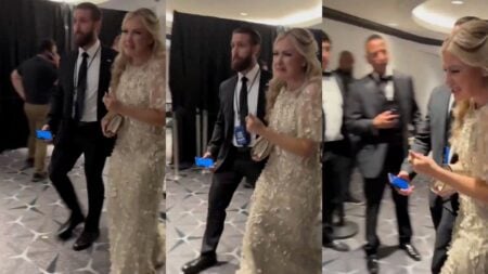 Erika Kirk, Turning Point USA CEO and widow of Charlie Kirk, is seen being escorted out of the Washington Hilton after shots were fired at the White House Correspondents' Dinner on April 25, 2026, visibly emotional and in tears.