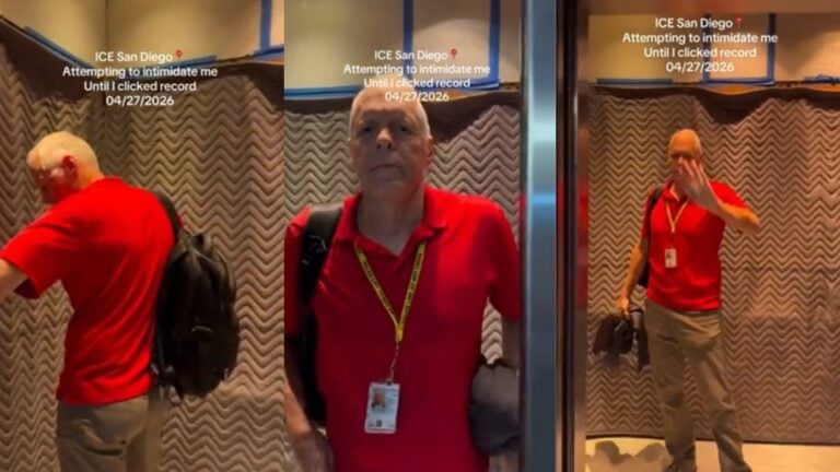 A person films an ICE agent standing inside an elevator in San Diego, California, as they confront the agent and zoom in on his identification badge during a tense confrontation posted to social media on April 27, 2026.