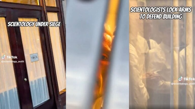 Scientology staff members are seen physically bracing against the doors of the Scientology Information Center on Hollywood Boulevard in Los Angeles, California, in an attempt to prevent viral speedrunners from entering the building.
