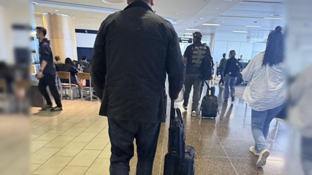 Delta Flight Passenger Walking Through Airport