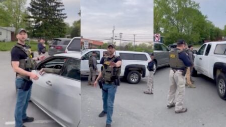Community members in New York surround ICE agents during a street stop, filming the encounter and demanding agents show a warrant to the people inside the vehicles.