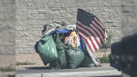 Homeless Person with American Flag