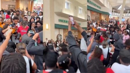 Hundreds of teenagers pack a Houston, Texas mall corridor near a Starbucks location, with many raising phones to record the scene during a social media-organized teen takeover event that prompted youth curfews at Memorial City Mall and Willowbrook Mall.