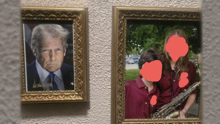 Trump Portrait Beside Family Photo on House Wall
