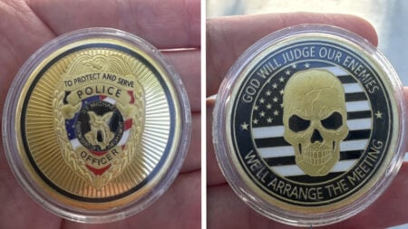 Utah Resident Holding Police Challenge Coin