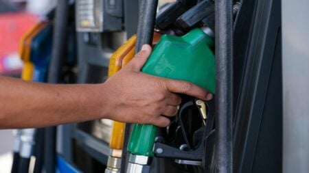 Someone buying gasoline from the store