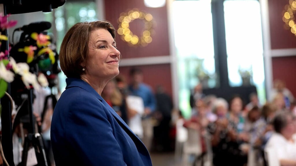Minnesota Voters Ruthlessly Mock Klobuchar After Reported Convention Outburst: ‘No One Is Owed the Right to Rule’ Amy Klobuchar speaking during Minnesota DFL convention in Rochester