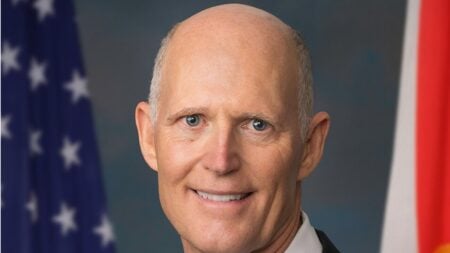 Florida Sen. Rick Scott posted a video on X contrasting costs from 50 years ago with today’s figures for healthcare, housing, and education. The clip, first reported by Punchbowl News, has sparked strong reactions questioning both his message and his record.