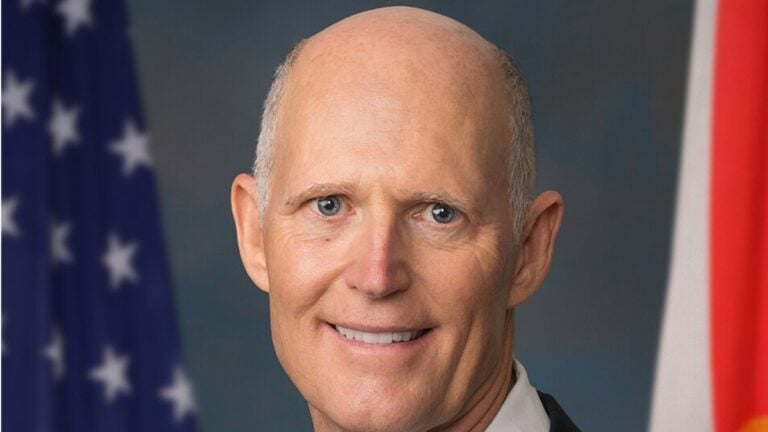 Florida Sen. Rick Scott posted a video on X contrasting costs from 50 years ago with today’s figures for healthcare, housing, and education. The clip, first reported by Punchbowl News, has sparked strong reactions questioning both his message and his record.