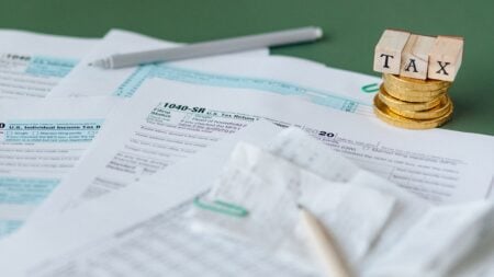 California Residents Angry After Lawmakers Approve New Taxes on Health Insurance and Software: ‘Even More Ways to Tax Us to Death’ A picture of tax sheets and pens.