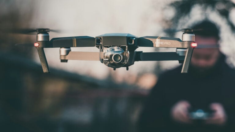 Man Flying a Drone