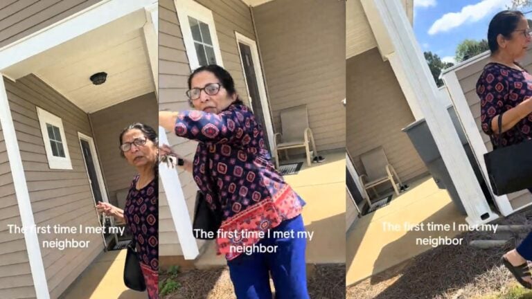 North Carolina Rapper Records Heated Encounter With Neighbor After She Threatens to Call Police: ‘I Don’t Blame Her at All’ Woman standing outside a home while holding a piece of mail.