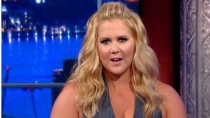 Snubbed Amy Schumer Fires Back at Taylor Swift and Travis Kelce After Brutal New York Wedding Diss Spree Goes Viral: ‘Yeah I’m a Warrior’ Amy Schumer during a late night interview on The Late Show with Stephen Colbert